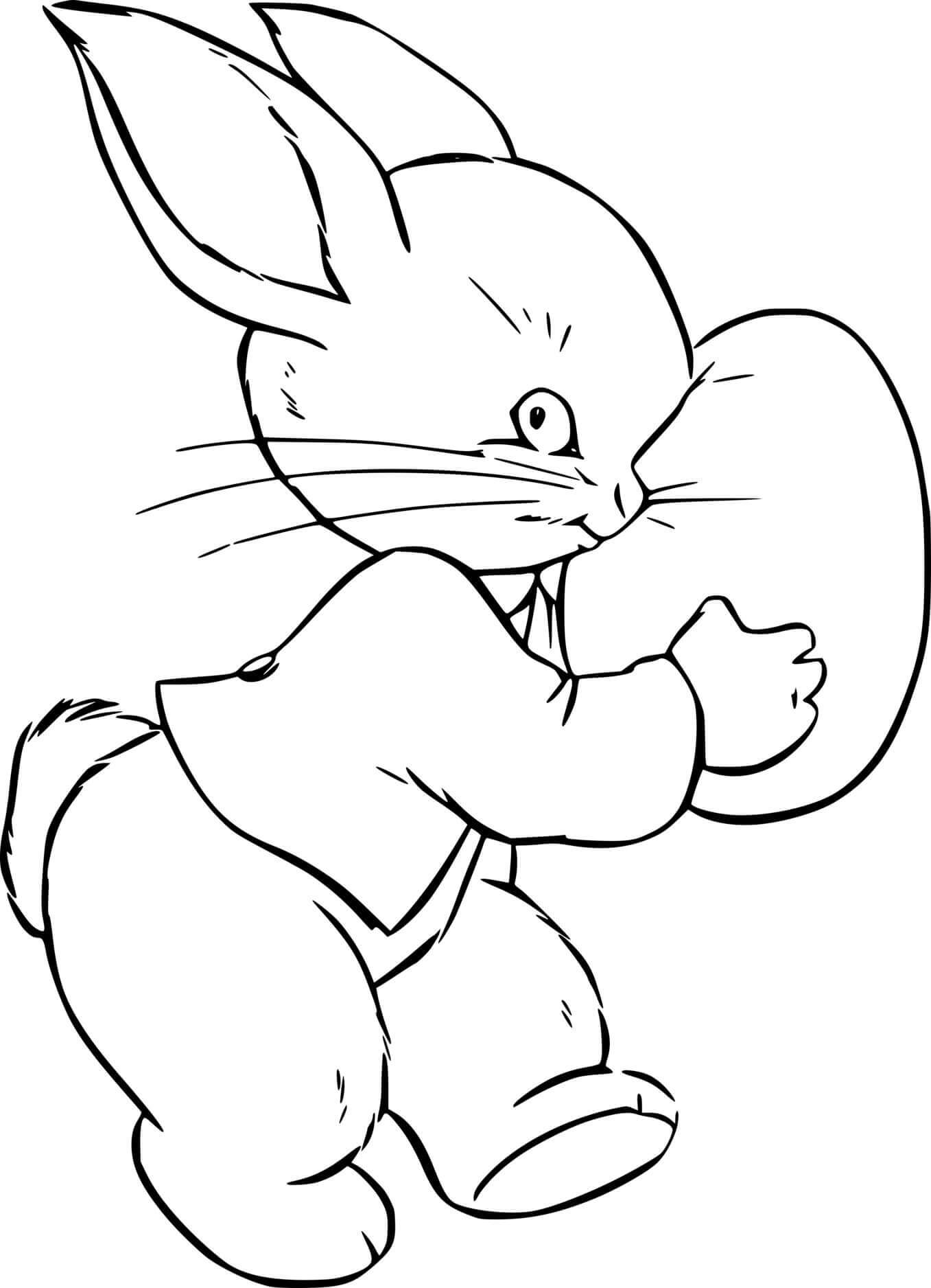 Easter Bunny Holds An Egg Coloring Page